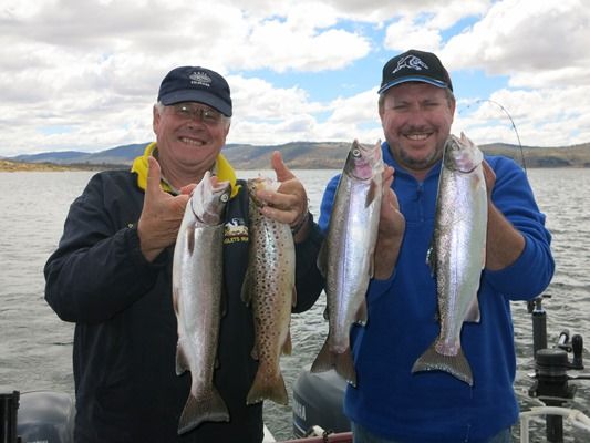 FISH MYTH BUSTERS! L to R. Nick Elliott and David Hogan with a fine brace of Rainbow and Brown Trout caught with Steve Williamson.