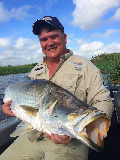 BY CATCH! Guest Noel Slabbert with his very first barra; an impressive 110cm specimen...but not the black bass the Fishing Australia team were after
