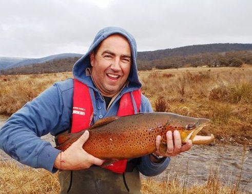 A happy angler with a superbly conditioned Snowy Mountains Spawn Run Trout