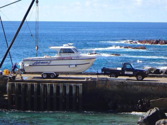 Launching boats via crane is the norm, with launch sites at each end of the island to suit most weather conditions