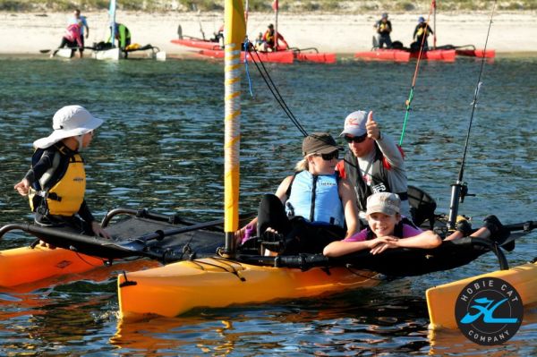 A family enjoying their new Hobie