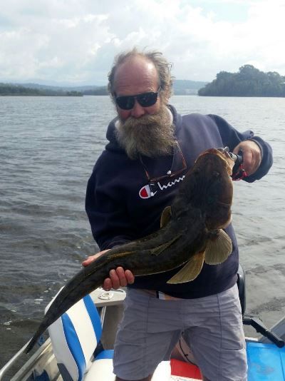 Ashley with a beautiful bait caught 87cm flathead