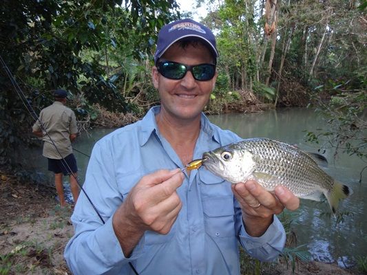 Rob's first jungle perch, with Bloomfield Lodge fishing guide Shayne Marks in the background