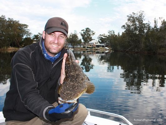 Not to be outdone, Liam Curtis with a 63cm winter flathead