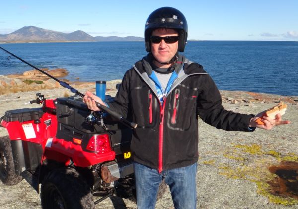 What-doesn't everyone fish talk eat and ride at the same time.  Rob on the Flinders Island Quad Bike Tour