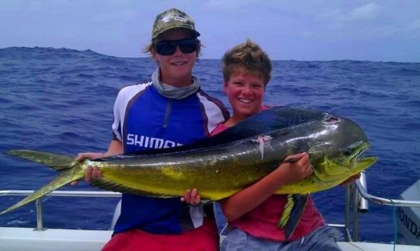 (L to R) Tim Stewart and Charlie Jabbour with one of the spectacular and tasty Mahi Mahi that are in excellent numbers along the south coast.
